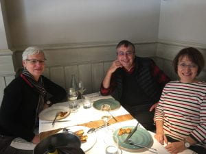 (from left) Louise McNally, Armin, and Junko dining in Barcelona.